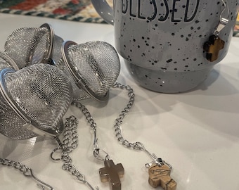 Tea strainer w/ cross charm