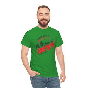 May include: A green t-shirt with a graphic design that says "God's Love Showers Like The Morning Dew" with the text "Psalms 133:3" underneath.