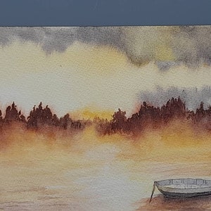 May include: A watercolor painting of a small boat on a lake with a misty background. The sky is a soft yellow and gray, and the trees are silhouetted against the horizon.