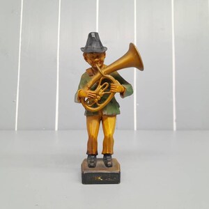 Black Forest Style Resin French Horn Player. 14.5cm