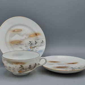 Early 20th century Japanese Kutani trio, Cup Saucer and Cake Dish