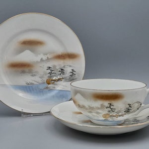 Early 20th century Japanese Kutani trio, Cup Saucer and Cake Dish