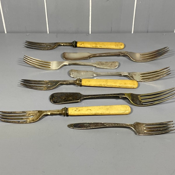 8 Assorted Electro Plated/ Stainless Dinner Forks.