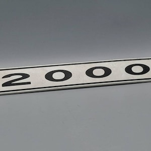 Vintage Car Badge, 2000 Sign / Badge -19.7cm