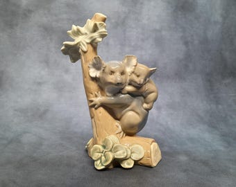 リヤドロ「ベッドタイム」5347 磁器の置物 時計と猫を持つ少女 - Etsy 日本