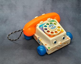 Teléfono antiguo Fisher Price Chatter y juguetes Fisher Price, juguetes antiguos de los años 60