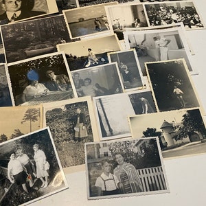 May include: A collection of vintage black and white photographs, some featuring people, some landscapes, and some buildings. The photos are arranged in a random order and are all of different sizes.
