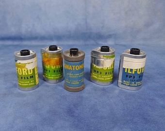 5 Vintage 35mm empty used film cassettes