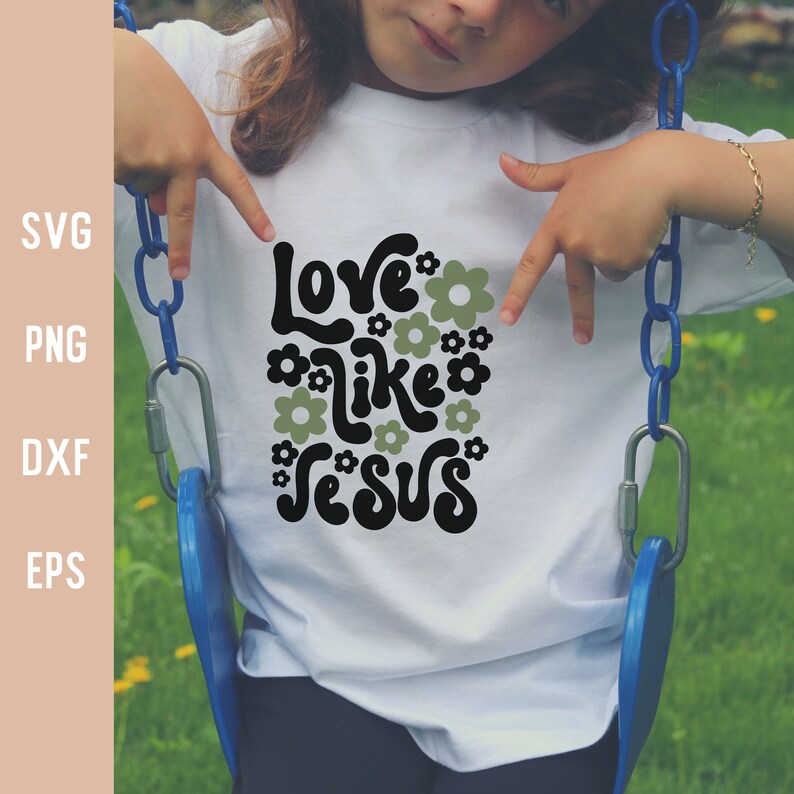 K&ouml;nnte beinhalten: Ein wei&szlig;es T-Shirt mit dem Text "Love like Jesus" in Schwarz mit gr&uuml;nen Blumen, die den Text umgeben.