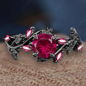 Naturinspirerad rund fyrverkerislipad rubinförlovningsring Massivt 10k/14k svartguld med twist och födelsesten i juli Löftesring med bladgren