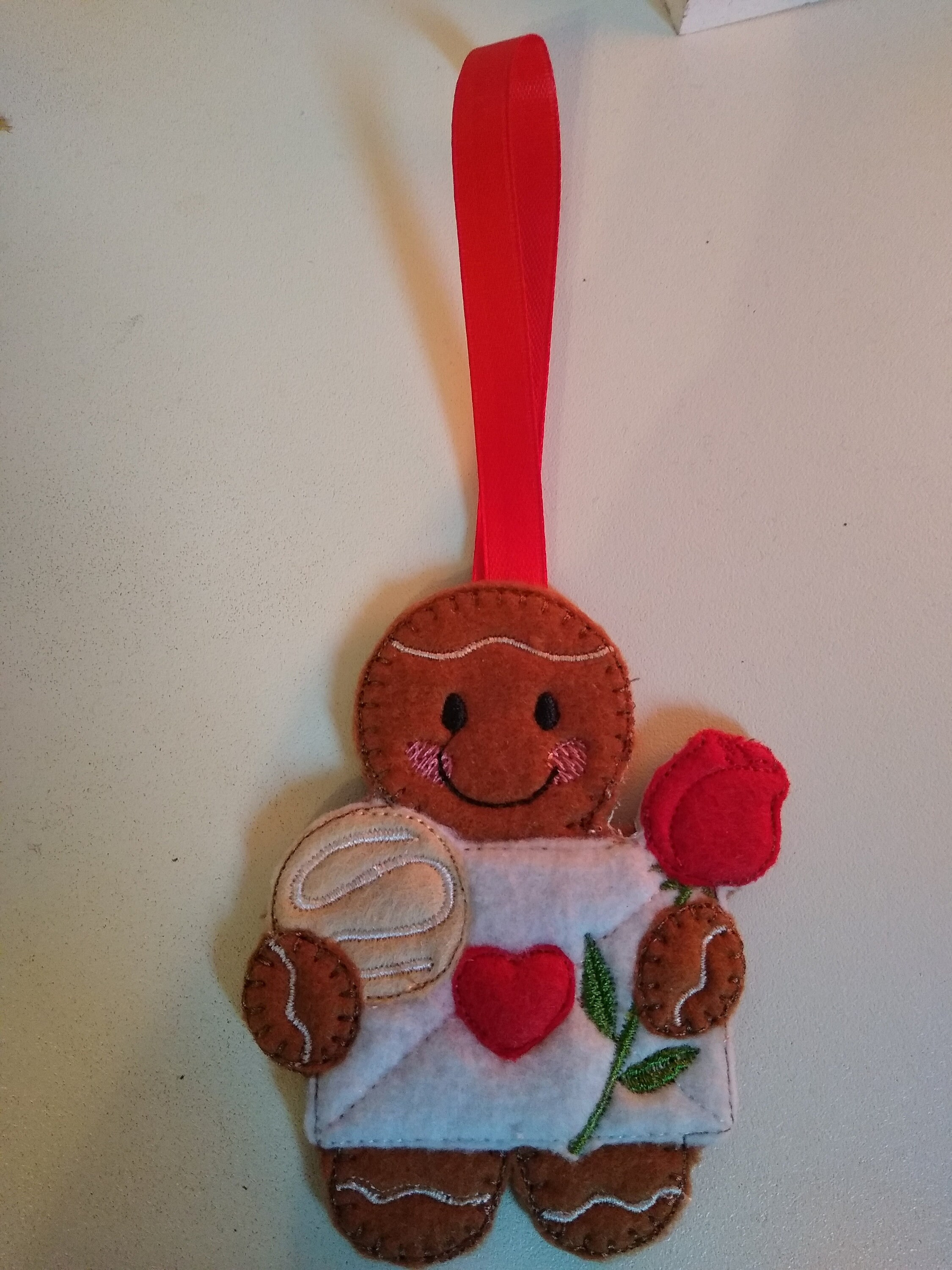 Valentines gingerbread man, rose and chocolates