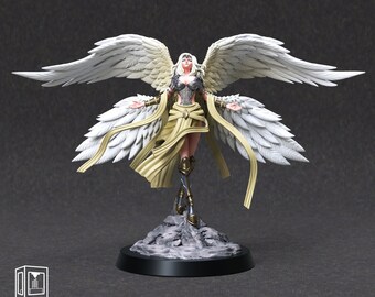 May include: A miniature figurine of Kara, a female angel with large white wings, wearing a gold and silver outfit. The figurine is on a rocky base with a black circular stand. The text "KARA" is above the figure.