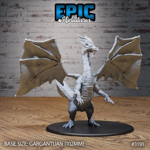 May include: A white dragon miniature with wings spread wide. The dragon is standing on a black base. The miniature is 102mm tall.  #3191  EPIC Miniatures