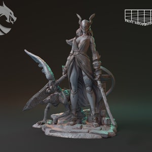 May include: A gray, detailed, 3D printed figurine of a female warrior with horns and a flowing robe, standing with a sword and a winged creature at her feet. The base is textured and has a rocky appearance.