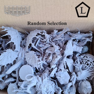May include: A box filled with a random selection of unpainted miniature figurines. The figurines are various fantasy creatures and characters, including dragons, angels, and warriors. The box has the text "Random Selection" printed on it.