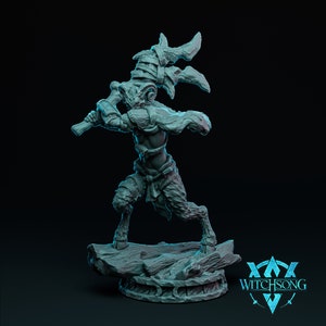 May include: A gray, detailed miniature figurine of a satyr holding a large, wooden club. The satyr is standing on a circular base with a textured surface. The base has the text "WITCHSONG" printed on it.