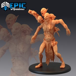 May include: A detailed miniature figurine of a monstrous creature with multiple heads and limbs. The creature is sculpted in a fleshy, pale orange color and has a menacing expression. The figurine is posed in a dynamic stance, suggesting movement and aggression.