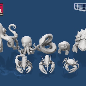 May include: A collection of 3D-printed miniature sea creatures, including an octopus, crab, lobster, turtle, and snake. The models are in a light gray color and are set against a dark blue background. The logo "STL Miniatures" is in the top left corner.