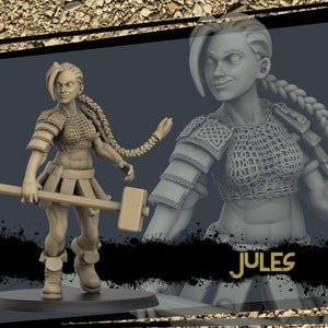 May include: A gray 3D printed miniature of a female warrior figure holding a large hammer. She is wearing chainmail armor and a braided hairstyle. The figure is standing on a round base. The text "JULES" is visible in the background.
