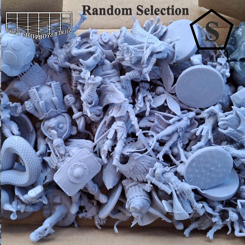 May include: A box filled with a random selection of small, light gray figurines. The figurines depict various fantasy characters, including warriors, creatures, and other miniature figures. The text "Random Selection" is visible on the box.