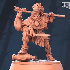 May include: A 3D-printed figurine of a warrior in a dynamic pose, holding a sword and a staff with a sack. The figure is in a reddish-brown color, with intricate details on the clothing and face. The base has a broken vase. The logo "STL Miniatures" is visible.