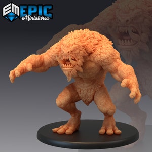 May include: A detailed miniature figurine of a furry, orange-brown creature with sharp teeth and claws. The creature is standing on a black base and has a fierce expression.