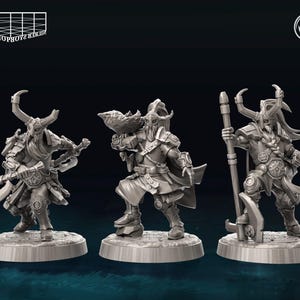 May include: Three gray plastic miniature figures of warriors with horned helmets and weapons. The figures are standing on round bases.