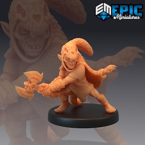 May include: A miniature figurine of a goblin warrior with a skull helmet and a double-bladed axe. The goblin is painted in a light brown colour and is posed in a fighting stance.