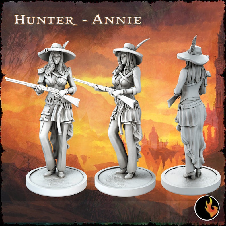 May include: A white painted miniature figurine of a woman wearing a wide-brimmed hat, a long coat, and holding a rifle. The figurine is standing on a round base. The background is a blurred image of a sunset.