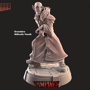 May include: A 3D-printed miniature of a vampire, labelled "Grandsire Mithrulis Varsik." The figure wears a long coat with fur trim and metal clasps. The base reads "Vampires."