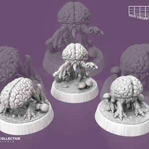Op de afbeelding: Vier 3D-geprinte miniatuur-hersenwezens met dunne poten en paddenstoelachtige uitgroeisels op hun bases. De wezens zijn in lichtgrijs geverfd.