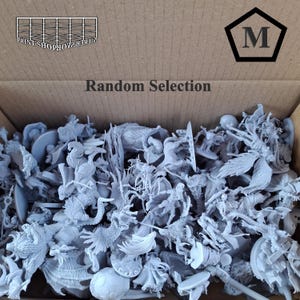 May include: A cardboard box filled with a random selection of unpainted miniature figurines. The figurines are various fantasy creatures and characters. The box has the text "Random Selection" and a logo with the letter "M".