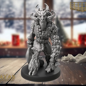 May include: A gray, detailed miniature figurine of a horned creature wearing a festive, fur-trimmed outfit and holding a bell. The creature has a beard and a menacing expression.
