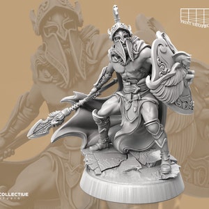 May include: A gray, detailed miniature figurine of a warrior wearing a helmet with a plume, holding a spear and a shield with a winged design. The figurine is standing on a rocky base.