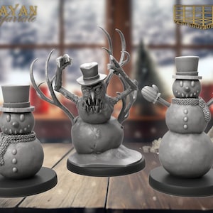 May include: Three snowman figurines, one with a traditional design, one with a scary, monstrous design, and one with a more whimsical design. The figurines are all made of gray plastic and are standing on black bases.