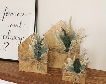 Wooden house with dried flowers and eucalyptus Boho style Scandi wooden decoration