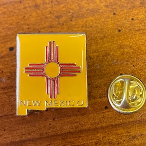 New Mexico lapel pin hand stamped and baked finished cloisonné pin