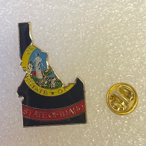 State of Idaho Lapel pin hand stamped and baked finished & Idaho State flags with brass grommets polyester fabric