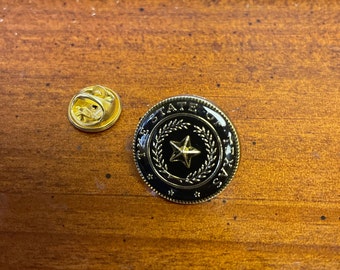 The state of Texas variations of lapel pin hand stamped and baked finished