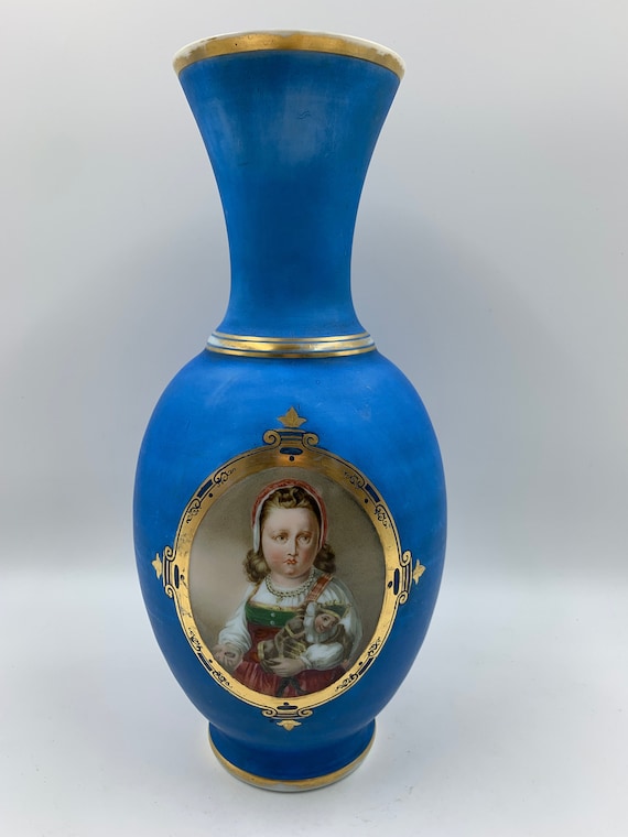 Blue Satin Painted White Vase With Fancy Panel of Painted Girl Holding Doll