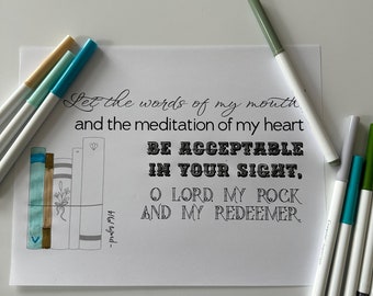 May include: A white paper with the text "Let the words of my mouth and the meditation of my heart be acceptable in your sight, O Lord, my rock and my redeemer." Several colored markers surround the paper. A small illustration of books is on the left.