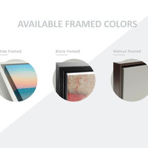 May include: Close-up of three framed canvases showing different frame colors: white, black, and walnut. The frames are all simple and modern.