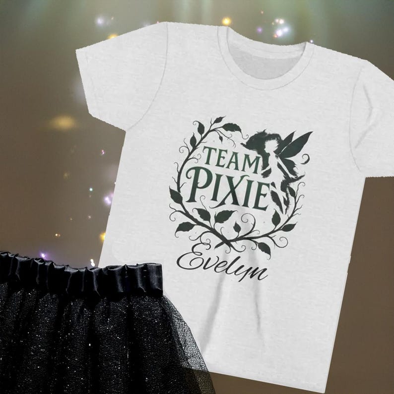 Gray Girl t-shirt with team pixie design and the name Evelyn printed below the dark pixie design.