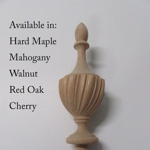 May include: A wooden finial with a fluted design, available in Hard Maple, Mahogany, Walnut, Red Oak, and Cherry.