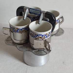 Italian retro four cup espresso maker Stovetop moka pot with four cups. 1970s