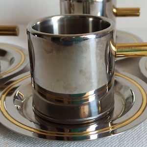 Classy espresso cup set, Meber, stainless steel with golden detail,  set of four double walled espresso cups.