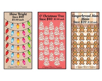 May include: Three printable Christmas craft sheets featuring a string of colorful lights, a stack of white and red Christmas trees, and a grid of gingerbread men. The text on the sheets reads "Shine Bright Save $90 $3.00 each", "O' Christmas Tree Save $40 $2.00 each", and "Gingerbread Man Minis Save $20 $1.00 each".