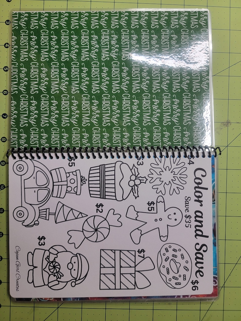 May include: Color and Save coloring book with a variety of Christmas-themed images to color. The images include a gingerbread man, a candy cane, a present, a snowflake, a cupcake, a car, and a donut. The book is priced at $6 and offers a $35 savings.