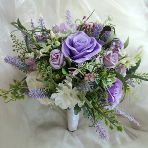 Lilac, Mauve & Ivory Rose large bridal bouquet. Bridesmaid bouquet also available.