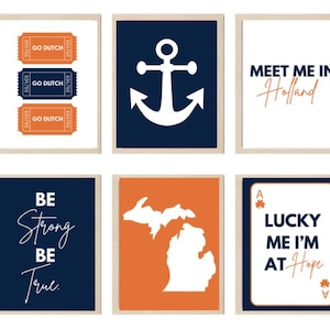 May include: Set of six framed art prints. The prints feature various designs, including tickets with "GO DUTCH" text, an anchor, the text "MEET ME IN Holland", the text "BE Strong BE True", a Michigan state outline, and the text "LUCKY ME I'M AT Hope".